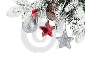 Fir tree branch with christmas decor