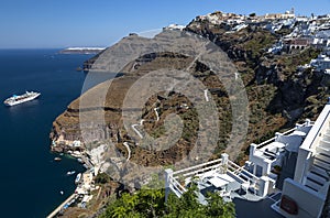 Fira panoramic view, Santorini island with donkey path and cable car from old port, high volcanic rocks in Greece