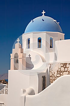 Fira town on Santorini island, Greece. Incredibly romantic sunrise on Santorini. Oia village in the morning light