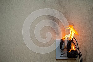 On fire adapter at plug Receptacle on white background
