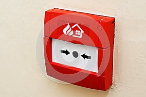 Fire alarm button on wall