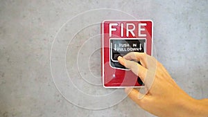 Fire alarm notifier or alert or bell warning equipment and hand use when on fire