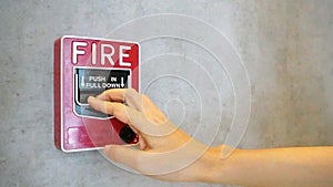 Fire alarm notifier or alert or bell warning equipment and hand use when on fire