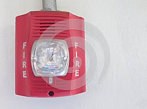Fire alarm with strobe light on white background