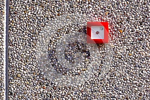 Fire alarm switch on brick wall texture background