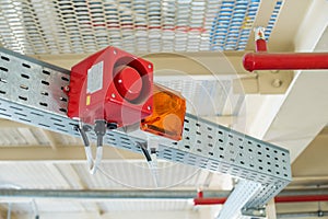 The fire alarm system. The combination of sound and light alert