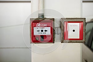 fire alarm on the white wall in the condominium place. standard safety in the resident,