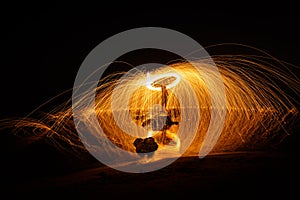 Fire ball long exposure using steel wool at night