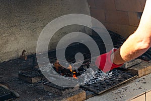 Fire in a barbaque, setting fire on coal barbacue