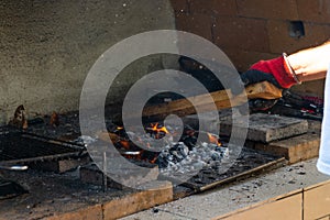 Fire in a barbaque, setting fire on coal barbacue