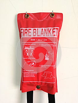 Fire blanket at the wall