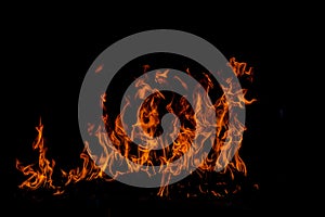 Fire blaze flames on black background. Fire burn flame isolated, abstract texture. Flaming explosion with burning effect