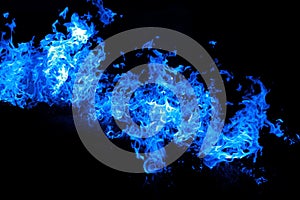 Fire blue flames isolated on black background