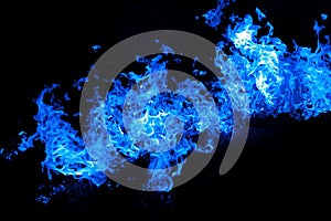 Fire blue flames isolated on black background