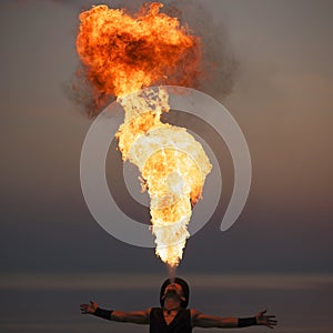 Fire-breathing show at night