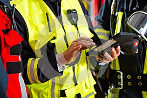 Fire brigade deployment plan on Tablet Computer photo