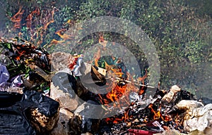 Fire burn garbage waste plastic, smoke polluted of waste plastic incineration, garbage waste disposal with burnt incinerate, fire