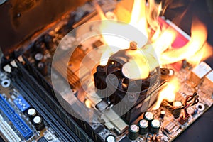 Fire Burning ,blazing computer motherboard, cpu,gpu and video card, processor on circuit board with electronic