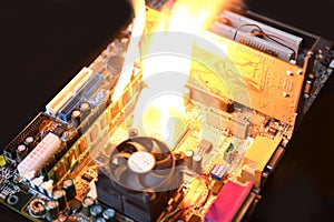 Fire Burning ,blazing computer motherboard, cpu,gpu and video card, processor on circuit board with electronic