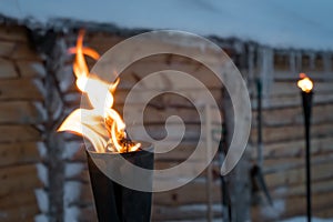 Fire burning inside metal torch