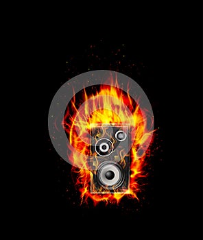 Fire burning speaker on black background