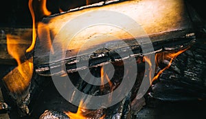 Fire burning wood and coal in the fireplace