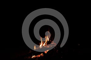 Fire in camping. Red fireplace and frame burning wood with coal in stove for giving warm, heat and smoke on black background