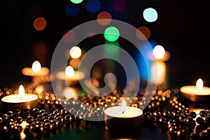 Fire of candle on christmas background. Christmas candles burning at night. Abstract candles background. 