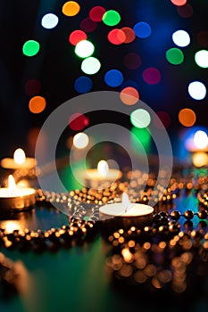 Fire of candle on christmas background. Christmas candles burning at night. Abstract candles background.