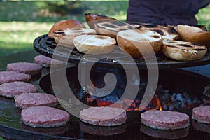 Fire with charcoals. Burning wood. Macro. Live flames with smoke. Wood with flame for barbecue and cooking bbq.