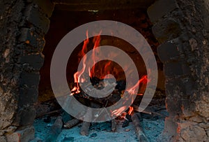 Fire for cooking in clay oven
