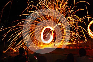 Fire Dance Along the Beach in the Dark