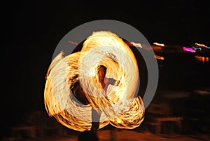 Fire Dance Along the Beach in the Dark