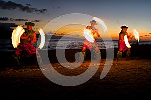 Fire Dancers at Dusk on the Beach