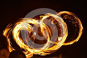 Fire dancing shows at night on the beach