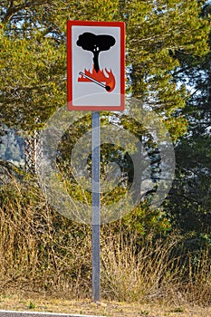 Fire danger sign near the mountain forest.