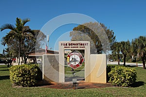melbourne, florida - feb 17, 2014: fire department indian harbour beach fire station department sign logo on grass 6 p