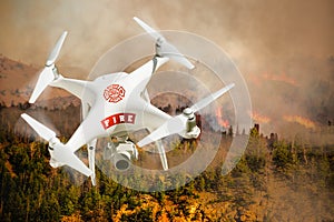 Fire Department Unmanned Aircraft System, UAS Drone Isolated Above a Forest Fire photo