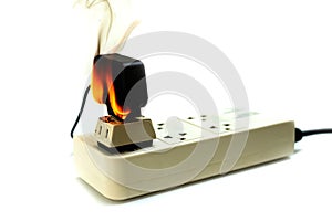 On fire electric wire plug Receptacle and adapter on white background