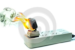 On fire electric wire plug Receptacle and adapter on white background