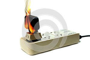 On fire electric wire plug Receptacle and adapter on white background