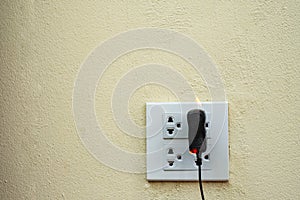 On fire electric wire plug Receptacle and adapter on white background