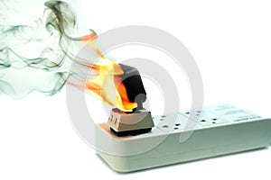 On fire electric wire plug Receptacle and adapter on white background