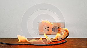 On fire electric wire plug Receptacle wall partition photo