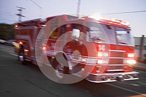 Fire engine driving down street