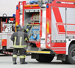 fire engine and two firemen