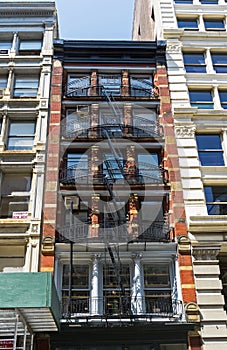 Fire escape staircases on the facade of the house