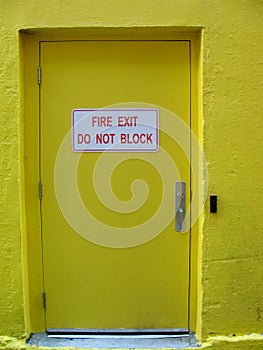 Fire Exit Do Not Block sign