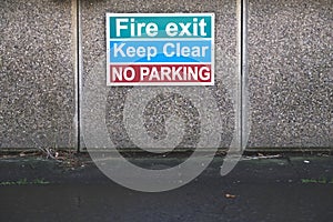 Fire exit keep clear no parking sign