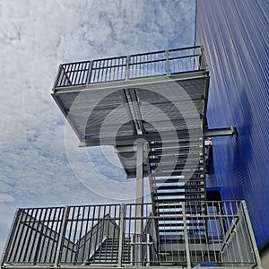 Fire exit stair of large factory building photo